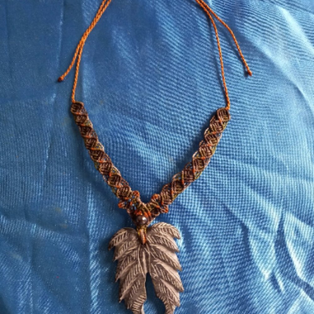 Peruvian necklace woven in macrame thread and natural stone